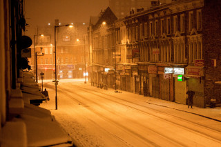 Snowy street buildings streetlight snow - a snowy street free wallpaper