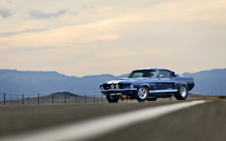 Blue mustang desert mountains fence - a road in the desert free wallpaper