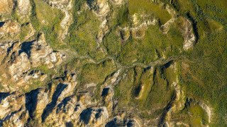 Mountain range aerial view tilt - anson maddock free wallpaper