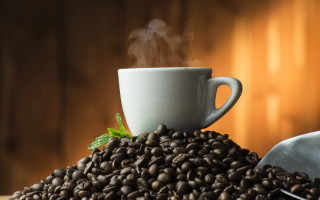 Coffee beans spoon leaf sunset - a plate free wallpaper