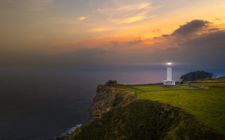 Lighthouse cliff ocean sunset cityscape - the cliff free wallpaper