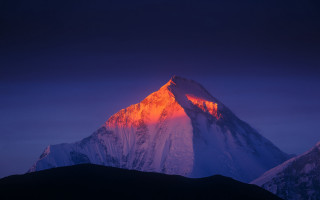 Mountain peak orange light dark - dramatic free wallpaper