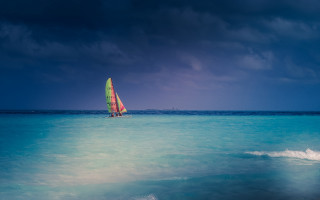 Sailboat ocean cloudy day blue - a cloudy day free wallpaper