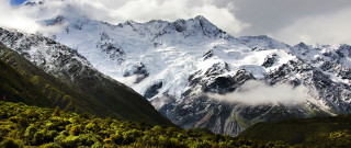 Mountain range cloudy sky forest - sky above free wallpaper
