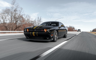 Black car road forest tiltshift - a black car free wallpaper