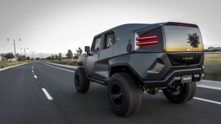 Black suv driving road grass - a road next free wallpaper