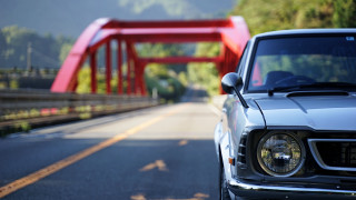 Car red bridge water tilt - anamorphic free wallpaper