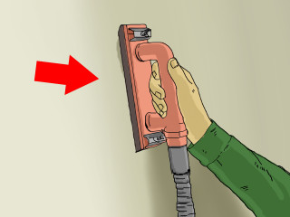 Person holding red object pointing - a red arrow free wallpaper