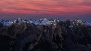 Mountain range pink sky clouds 15 - a view of a mountain range free wallpaper