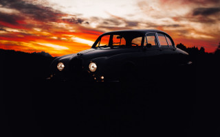 Black car field sunset red - a black car free wallpaper
