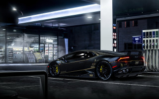 Black sports car night cityscape - andrew law free wallpaper