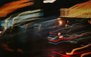 City street night futurism blurry - a blurry photo of a city street free wallpaper