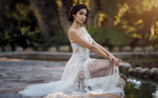 Woman white dress rock water - a rock free wallpaper