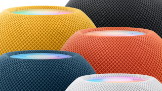 Colorful speakers white surface black - product photo free wallpaper