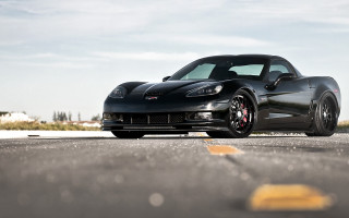 Black sports car parking lot 13 - the side of the road in a parking lot free wallpaper