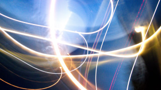 Blue sky light streak person - a person in the background free wallpaper