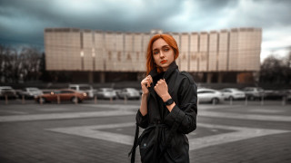 Woman umbrella parkinglot building city - her hand and a building in the background free wallpaper