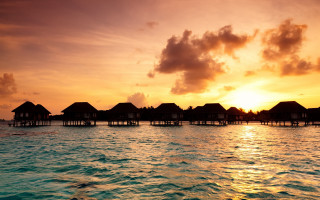 Sunset water huts boats dusk - a few boat free wallpaper