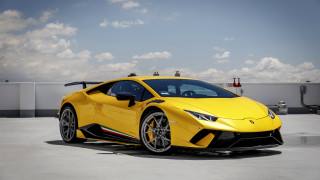 Yellow sports car parking lot 7 - a yellow sports car free wallpaper
