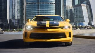 Yellow car black stripe city - a city free wallpaper