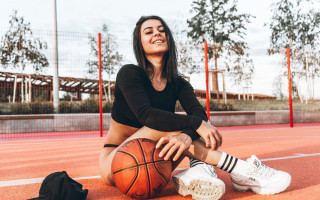 Woman sitting basketball shoes winter - athletic free wallpaper