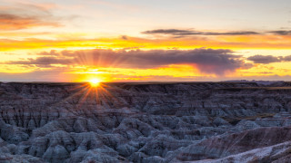 Sunset rocky landscape clouds horizon - a sun free wallpaper