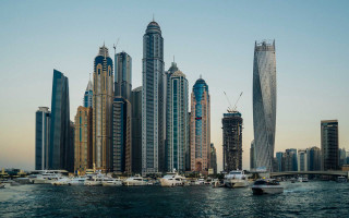 Boats cityscape bridge skyline water - the background and a bridge in the foreground free wallpaper