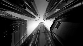 Black white building sky circular - photo of a building free wallpaper