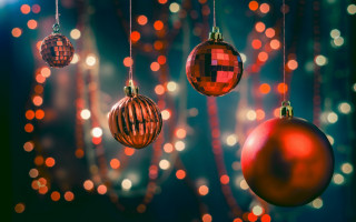 Christmas ornaments bokeh lights night - the background and a blurry background behind them free wallpaper