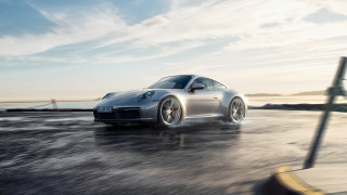 Silver sports car ocean road - a silver sports car free wallpaper for desktop