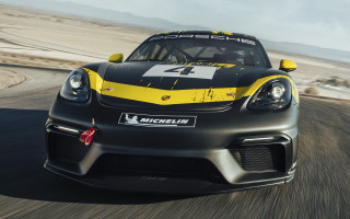 Yellow black sports car desert 2 - a road in the desert free wallpaper