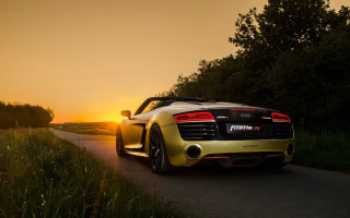 Yellow sports car backlit sunset - a yellow sports car free wallpaper