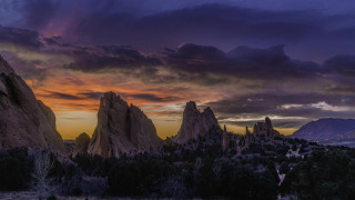 Sunset mountain range trees rocks - a sunset over a mountain range free wallpaper