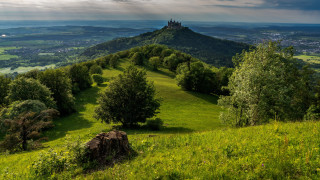 Romantic castle grassy hill nature - a grassy hill free wallpaper