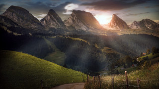 Scenic mountain range path sunset - a scenic view of a mountain range free wallpaper