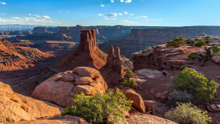 Canyon rock formation blue sky - a rock formation in the foreground free wallpaper