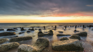 Sunset beach rocks water cloudy 4 - rock and water free wallpaper