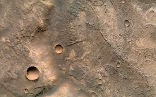 Rock wall holes dirt closeup - a rock wall free wallpaper