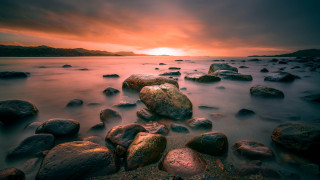 Sunset rocky beach cloudy sky 3 - rich moody colour free wallpaper