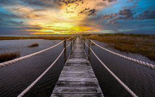 Wooden bridge sunset clouds mountains - sunset free wallpaper