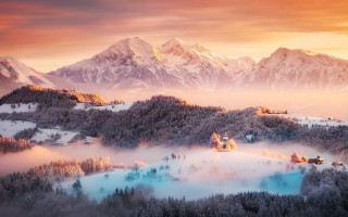 Mountain lake castle sunset romantic - a scenic view of a mountain range free wallpaper