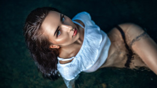 Woman white shirt black tie - the ground in the dark free wallpaper