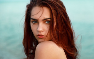 Woman red hair ocean serious - long red hair free wallpaper