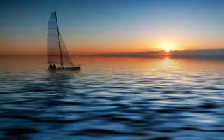 Sailboat ocean sunset horizon digital - a sailboat free wallpaper