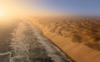 Sandy beach water sunset desert - a sandy beach free wallpaper