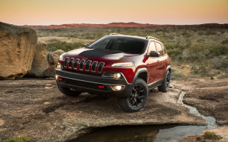Red jeep rocky cliff water - a red jeep free wallpaper