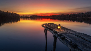 Lantern dock lake sunset reflection - a reflection of the sky free wallpaper