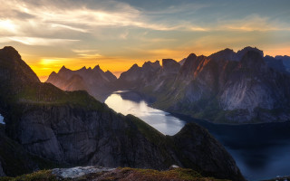 Mountain lake sunset clouds artist - a lake in the middle of it free wallpaper
