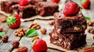 Brownies strawberry nuts wooden table - a strawberry free wallpaper