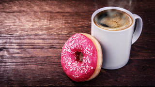 Pink donut coffee wooden table - a wooden table top free wallpaper